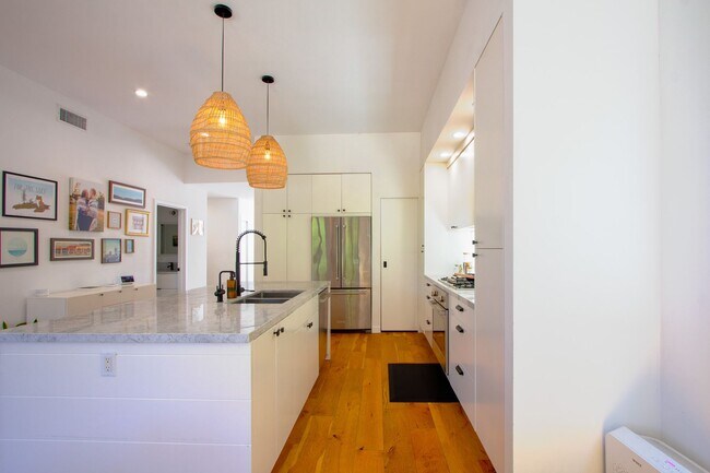 Building Photo - Spacious 4BR/3BA Westchester Home with Private Backyard, BBQ & Security System