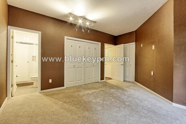 Building Photo - 2 Bed, 2 Bath Condo with Roof Top Patio, Covered Balcony and Secure Garage