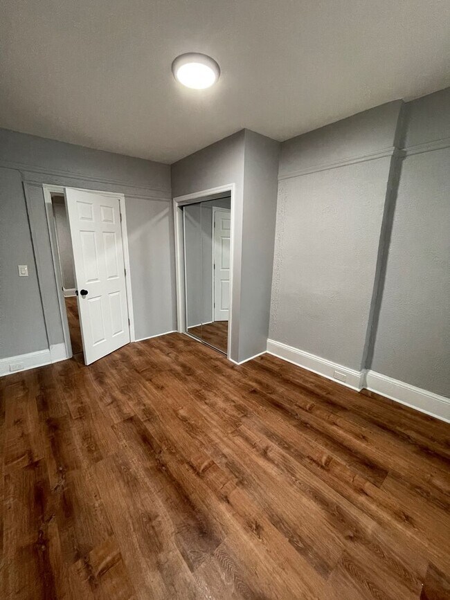 Building Photo - Updated 3 Bedroom House With a backyard and Laundry