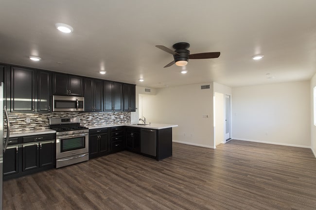Building Photo - Must See 4 BR Townhome Blocks to USD with ...