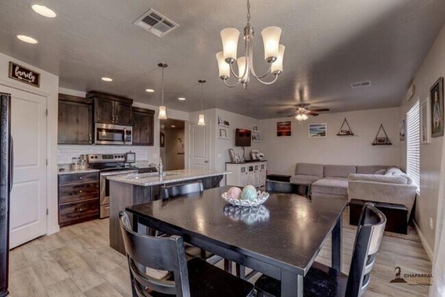 Building Photo - Pet Friendly: 3 Bedroom Fossil Hills Townhome With 2 Car Garage