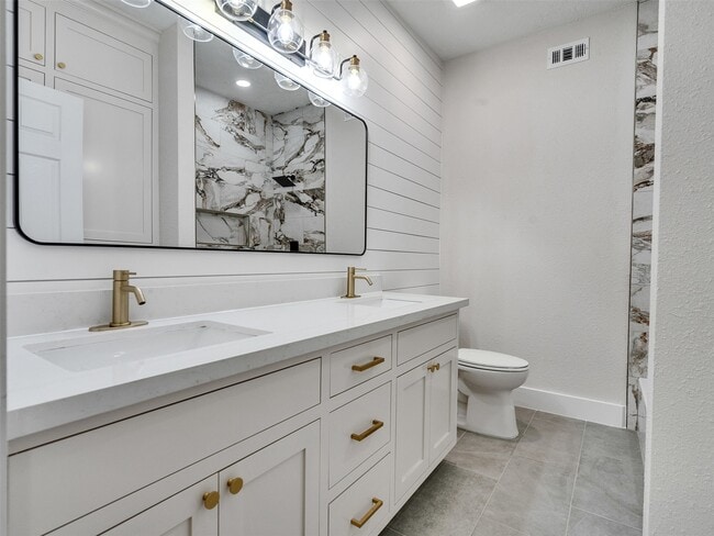 Building Photo - 7016 Delesandri Dr