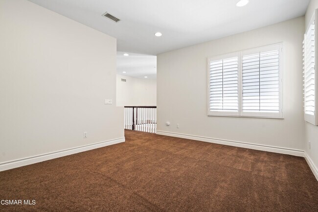 Building Photo - 6077 Mandeville Pl