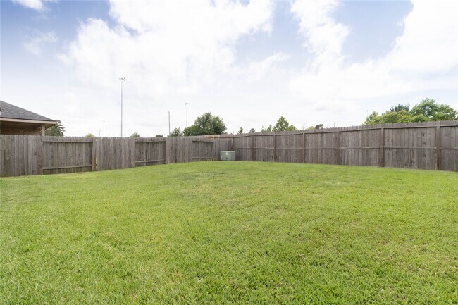Building Photo - 24423 Raindrop Poppy Dr