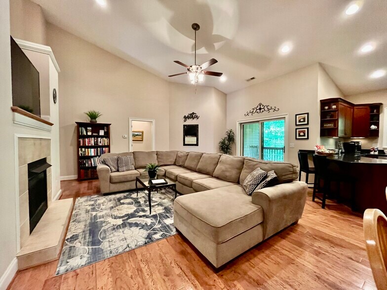 Great Room - Fireplace and Vaulted Ceilings - 35 Winterhawk Drive