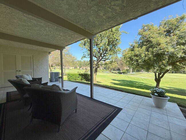 Building Photo - Enjoy stunning panoramic views of the golf...