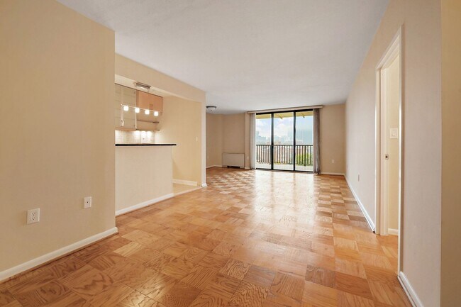 Building Photo - Spacious, and Sunlit 1 BD/1 BA Condo w/Reserved Garage Parking and Utilities Included in Chevy Ch...