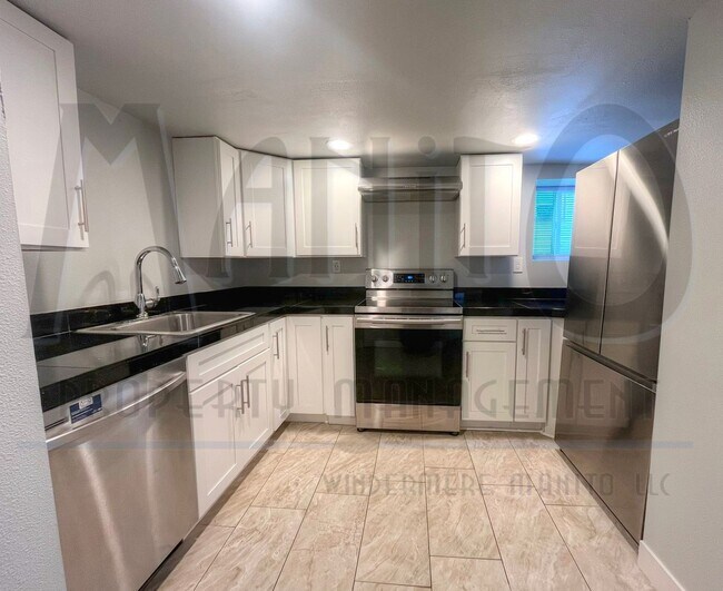 Building Photo - Garland Triplex