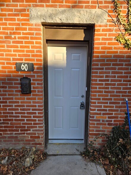 Charming brick exterior with private entrance at 60 W Winter Street. - 60 W Winter St