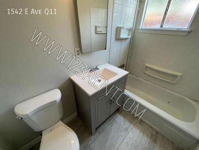 Building Photo - 1542 E Ave Q11