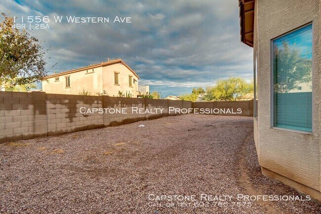 Building Photo - 11556 W Western Ave