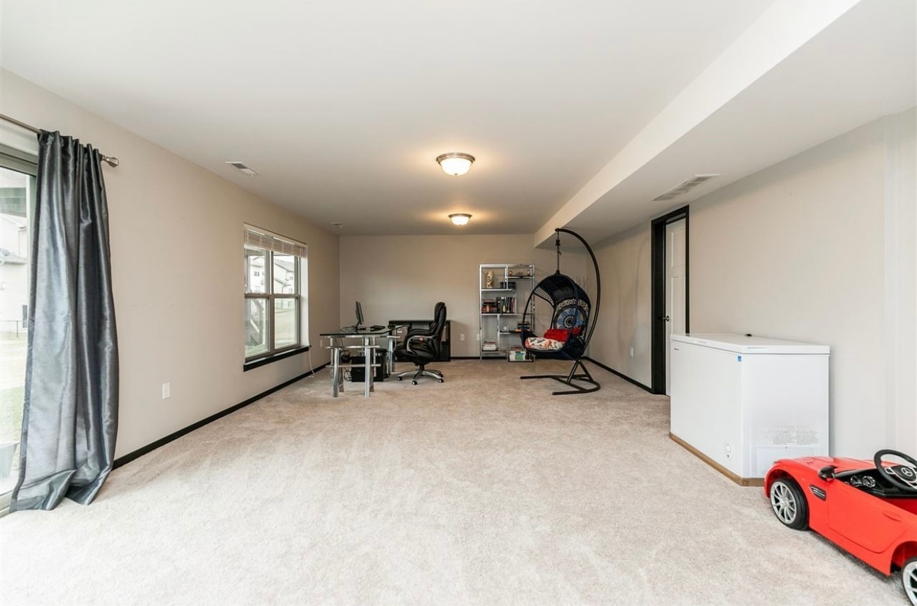 Bonus room on lower level - 442 Watts Ct