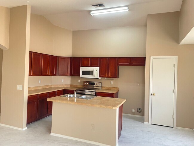 Building Photo - 4 Bedroom, 2 Bath New paint and flooring