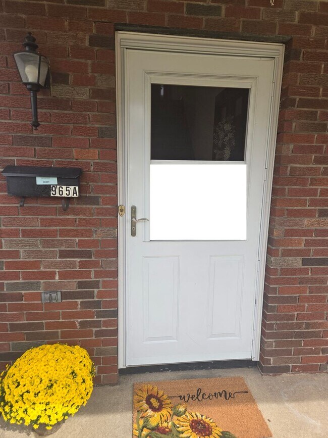 Building Photo - Updates abound at this SPACIOUS, half duplex with 3+ off-street parking spots, 3-bedrooms and 2 f...