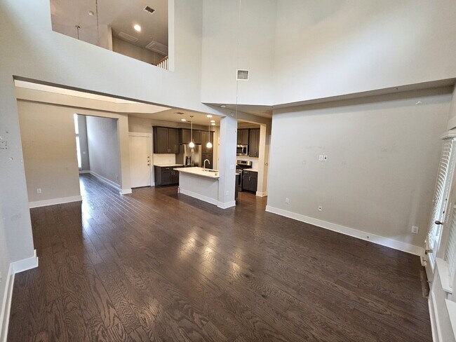 Building Photo - Experience Modern Living: Spacious 3-Bed, 3-Bath Townhome with Two Primary Bedrooms