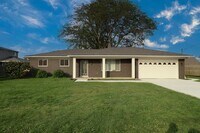 Building Photo - Three Bedroom 1.5 bathroom ranch on a canal