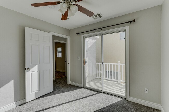 Building Photo - Gated Townhome with Strip Views from the Balcony!