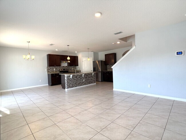 Building Photo - Move-In Ready • Lawn Care Included • Pet-Friendly!