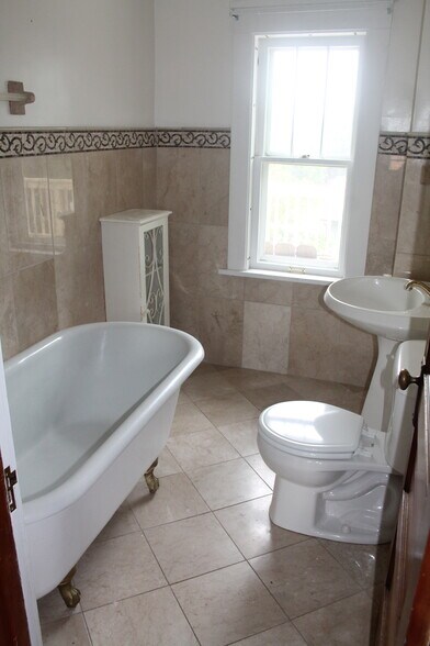 Marble Luxury Bath with heated floor - 106 SE 2nd Ave