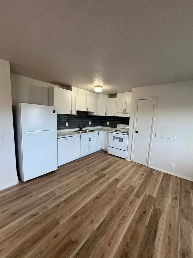 Building Photo - Welcome to Your Next Home with Harvest Management