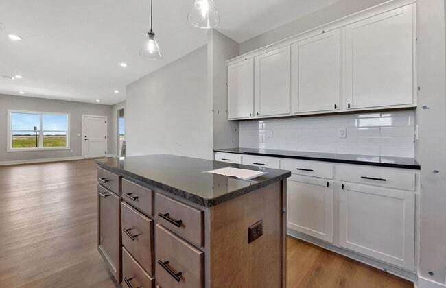 Building Photo - Modern 3-Bed Ranch in Maize – Zero-Entry L...