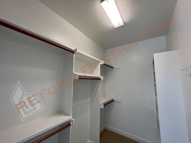 Building Photo - Elegant 3 Story 3 Bedroom Formal Model Tow...