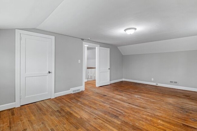 Building Photo - Brick home, Two Story, Hardwoods, DR, 2 Sun Rooms, FP, Carport!.