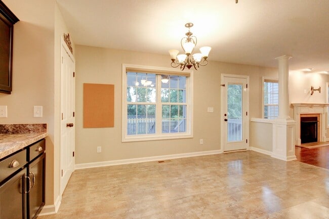 Building Photo - Stunning Brick Front Home With Fireplace A...