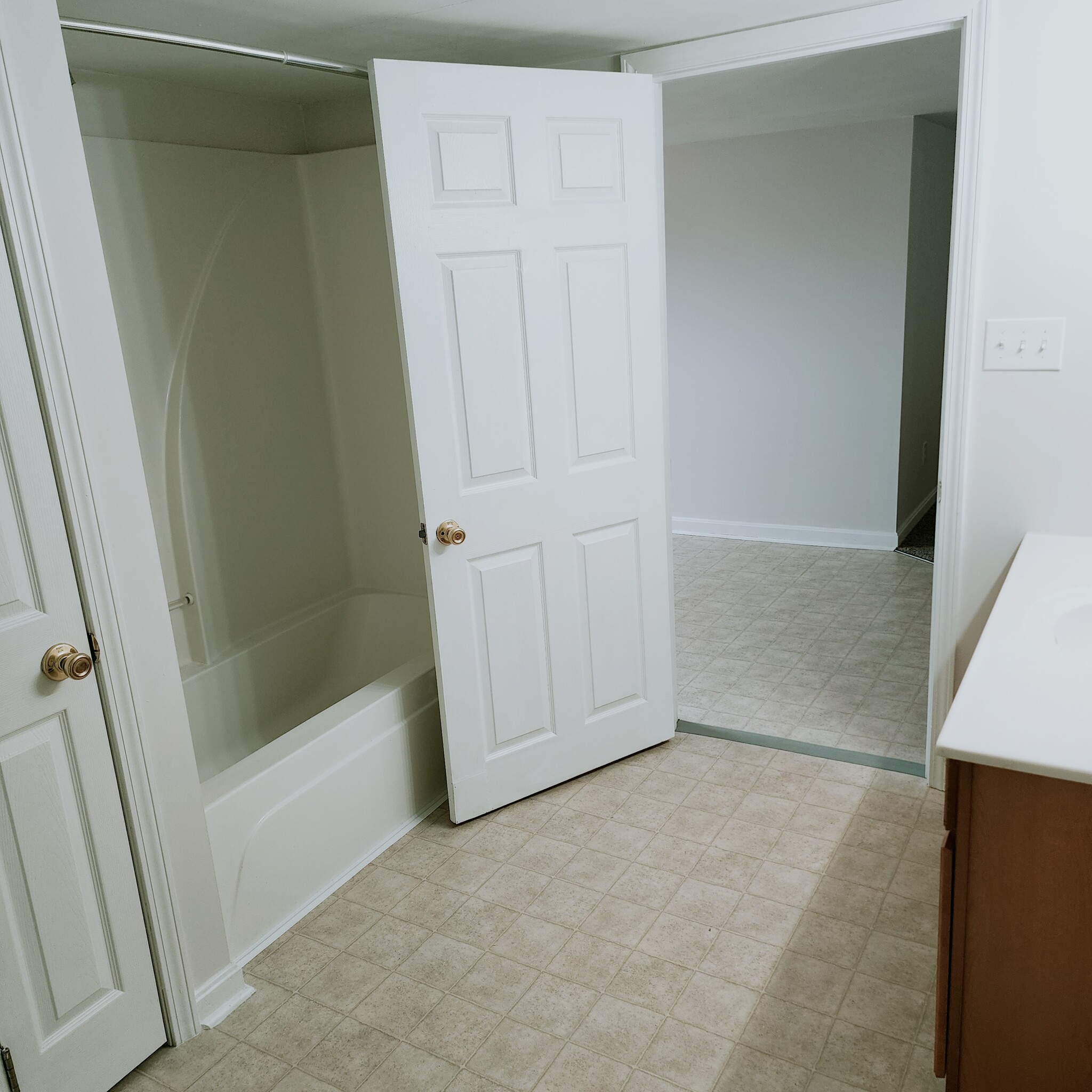 Large bathroom with linen closet, shelving and washer/dryer hookups - 882 N Base Rd