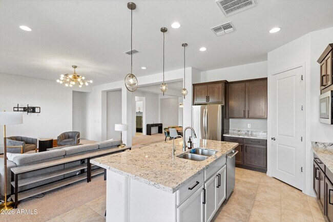 Building Photo - 10812 E Tesla Ave