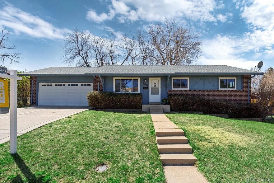 Ranch level home with attached 2 car garage and driveway for off street parking.! - 7896 E Jefferson Pl