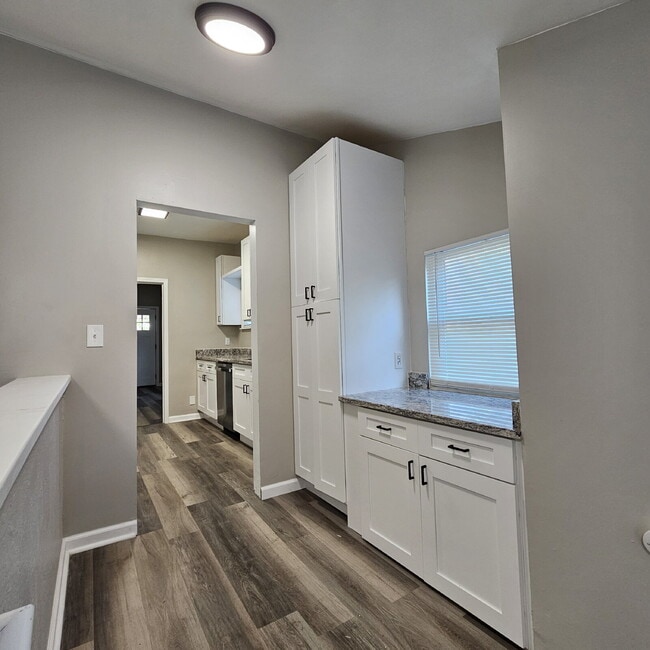 Building Photo - Duplex - 2 Bedroom Completely Remodeled Living Space with New Laminate Flooring on Main Floor alo...