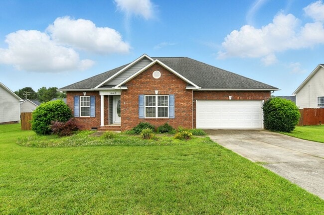 Building Photo - Charming 3BR Brick Home with Private Yard ...