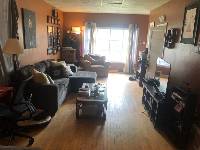 Living room view from backdoor/kitchen with different couches - 2730 N Oakland Ave