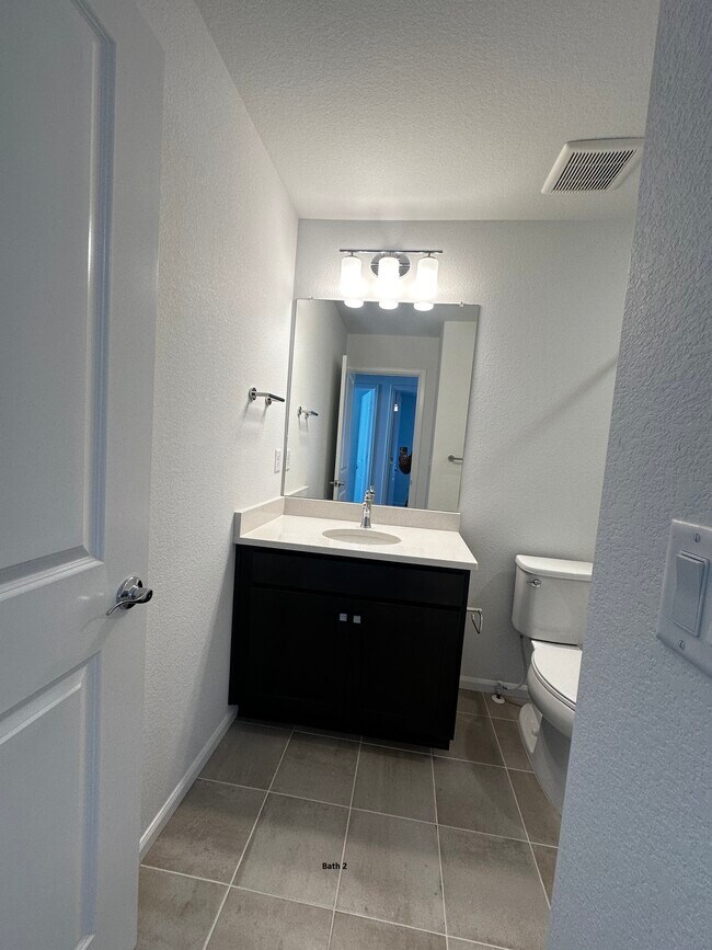 Building Photo - 21154 E 63rd Dr