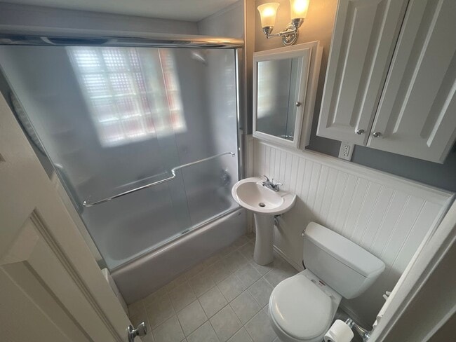 Building Photo - Charming 3-Bedroom Home with Backyard & Of...