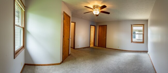 bedroom 1 w/walk-in closet and access to deck - 3118 S 116th St