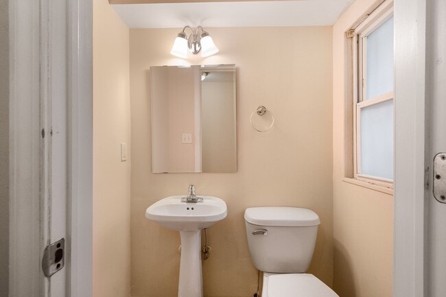 Building Photo - Spacious 2BR/2.5BA Townhome with Finished Basement & Extra Storage