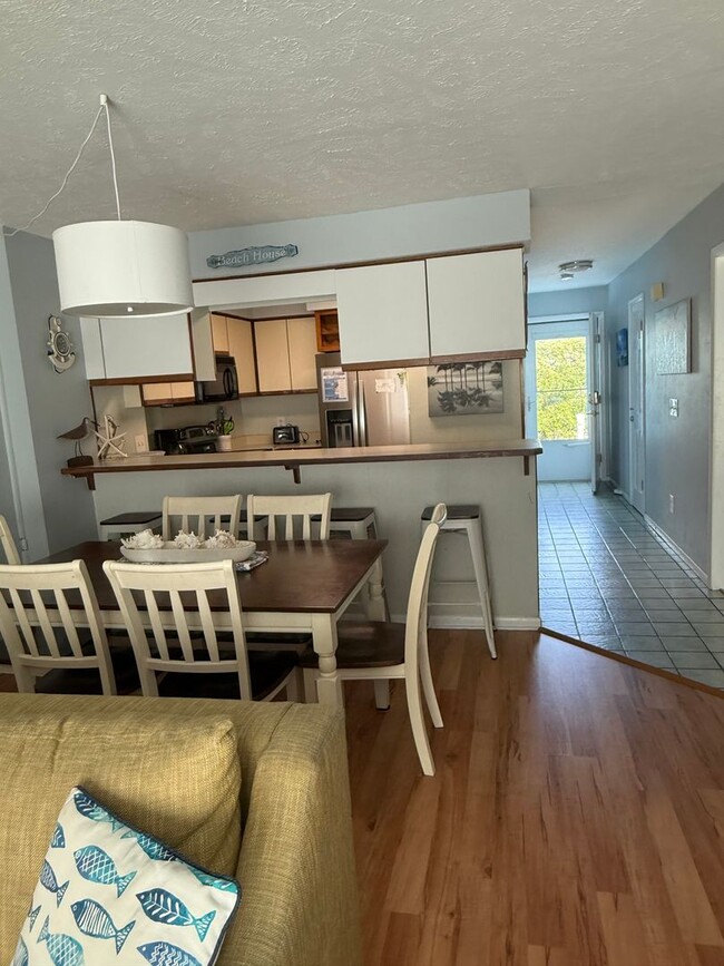 Building Photo - NEW OWNERS OF THIS FURNSIHED OFF-SEASON RE...