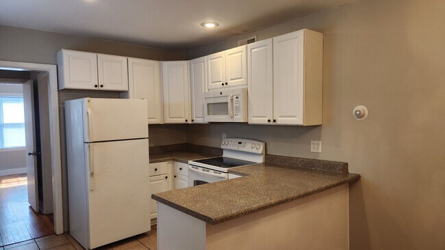 Building Photo - Four Bedroom House Available NICE