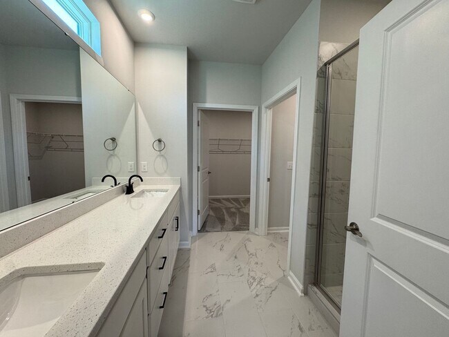 Building Photo - Spacious 1.5-Story 4BR Home with Bonus Room in Active 55+ Community