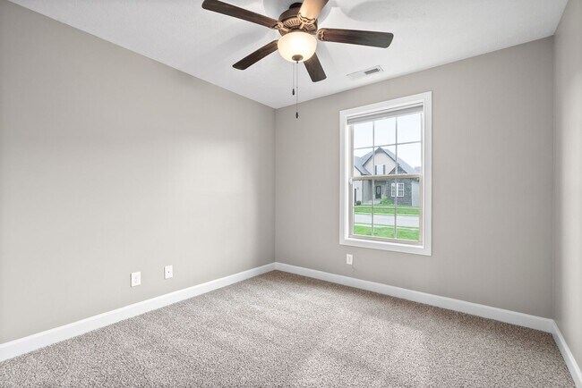 Building Photo - Pet Friendly Three Bedroom with Bonus!