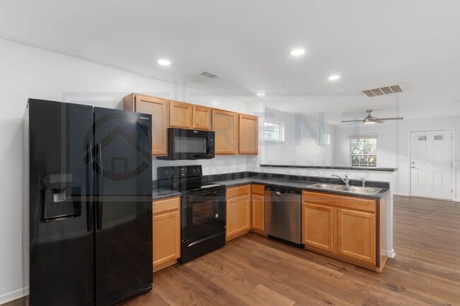 Building Photo - Available Now: Updated 3 Bedroom with Garage!