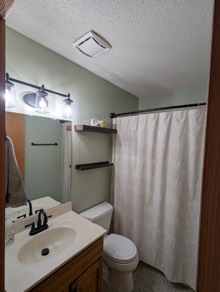 Upstairs bathroom vanity - 6186 S Pointe Dr SW