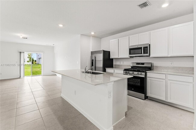 Building Photo - 10722 NW Moon Rise Ln