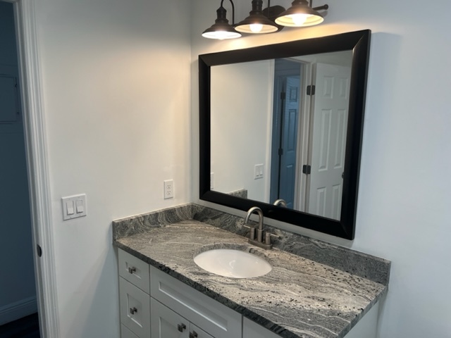 New bathroom vanity, mirror and light fixture - 4896 SE Horizon Ave