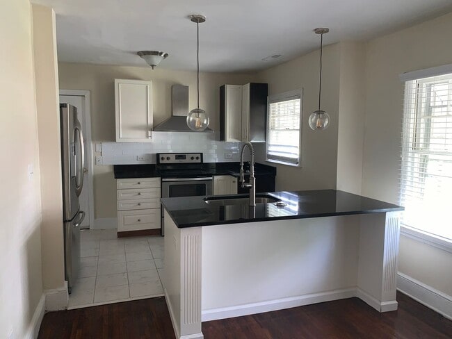 Building Photo - Charming and Modernized Three Bedroom Home...