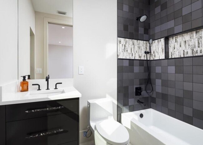 Building Photo - STUNNING REMODELED 4-BEDROOM, 3.5-BATH FUR...