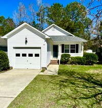 Building Photo - Charming 3X2 with Screened In Porch + Fenc...