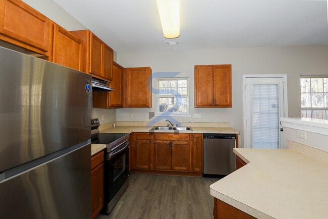 Building Photo - Move in before January 31st and choose your reward: a $250 Amazon Gift Card or a 55" Smart TV!